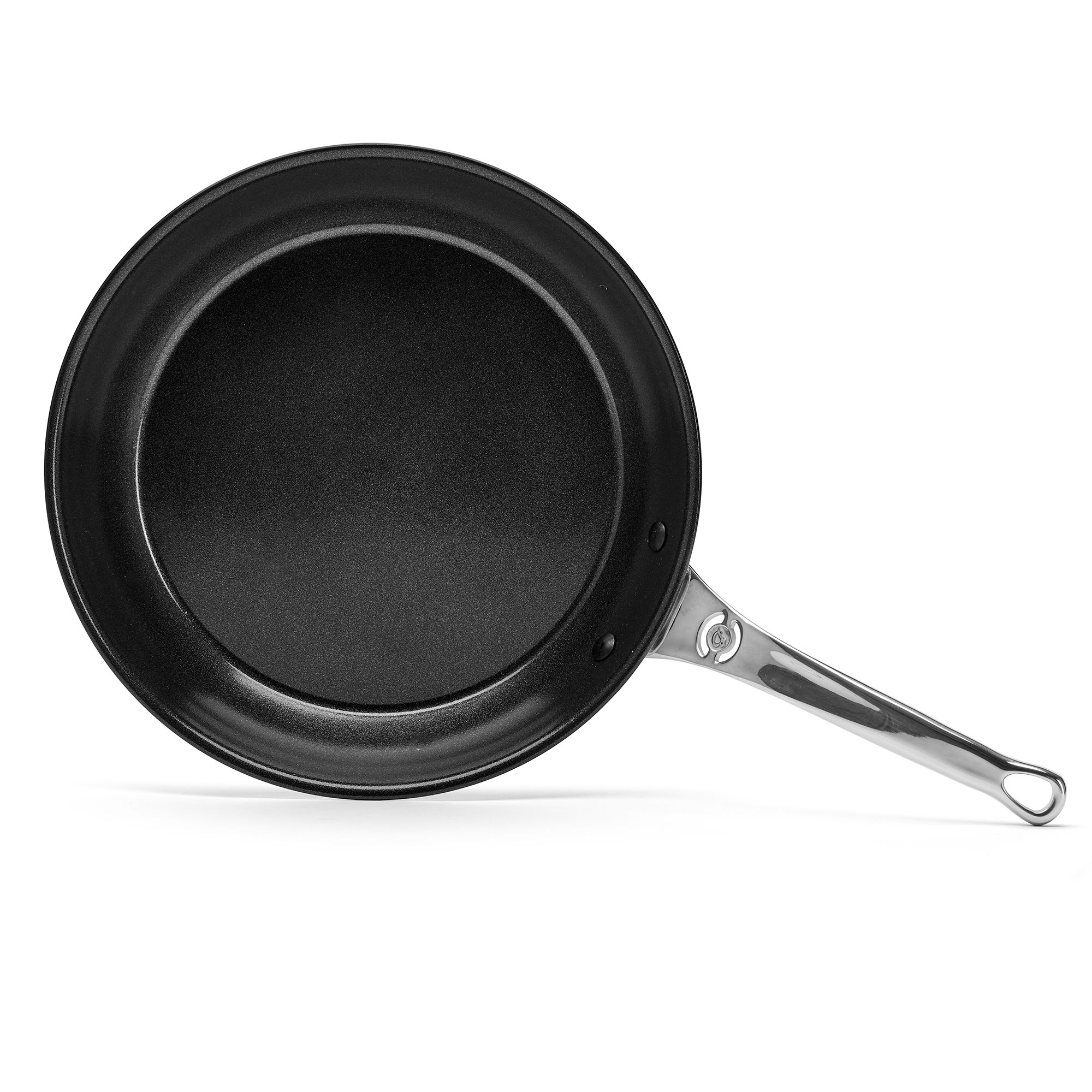 Round black frying pan with metal handle
